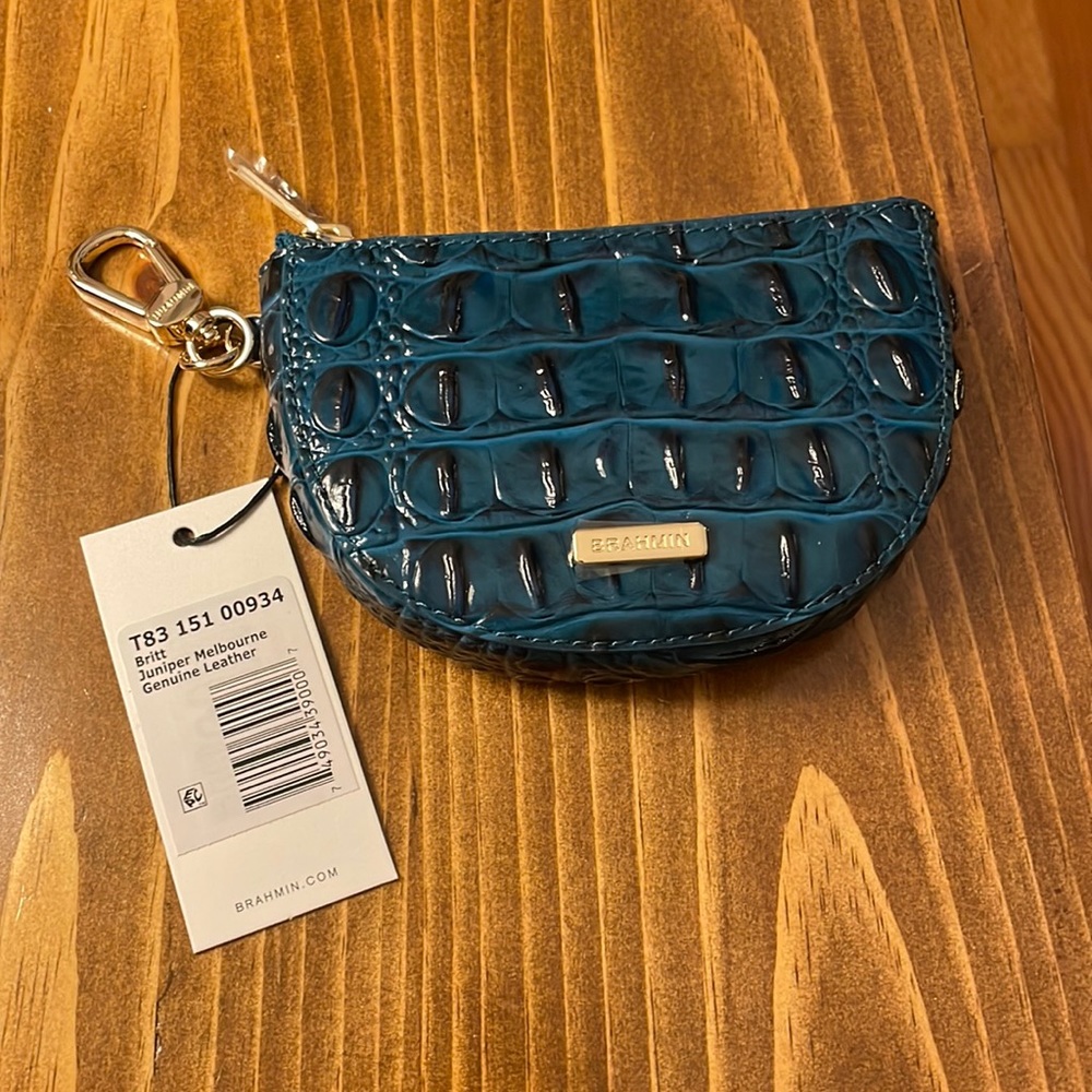 Brahmin coin holder with a soft half-moon silhouette. Genuine leather NWT